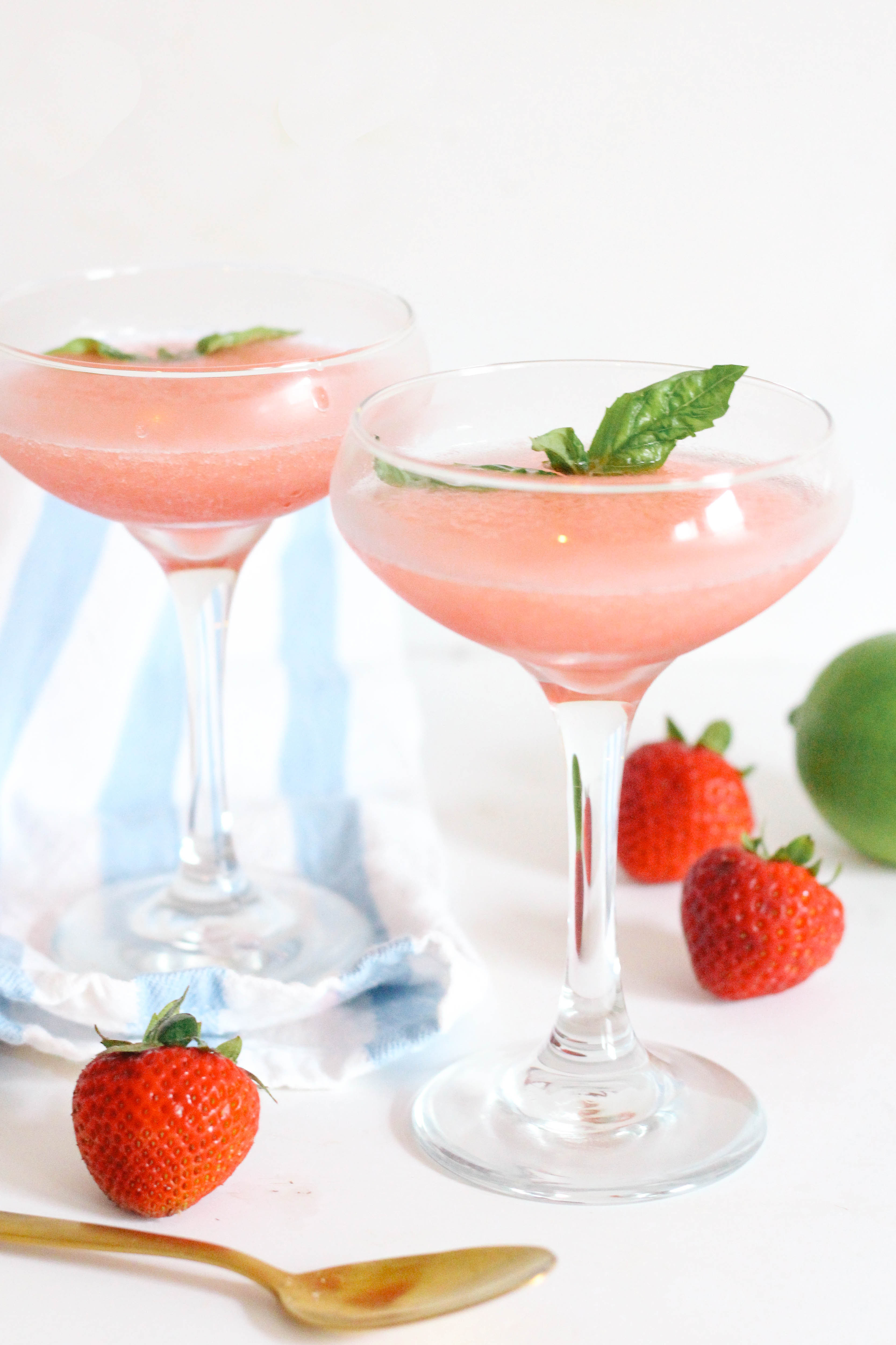 Frosé! The trendiest cocktail of the summer! This recipe combines fruity rosé, sweet strawberry and zesty lime in the most refreshing and beautiful summer drink!