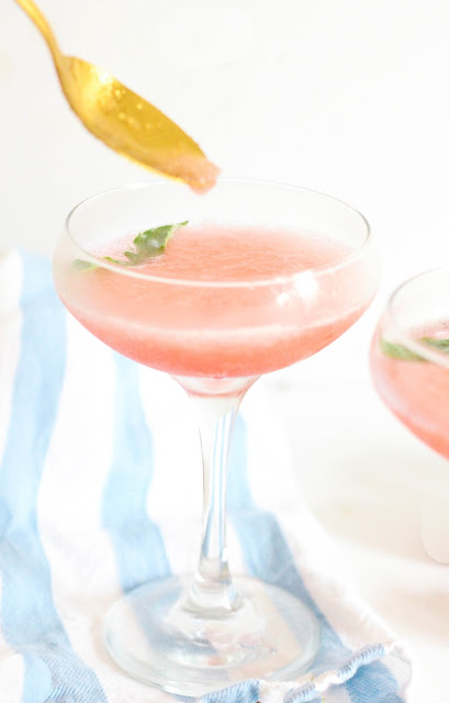 Frosé! The trendiest cocktail of the summer! This recipe combines fruity rosé, sweet strawberry and zesty lime in the most refreshing and beautiful summer drink!